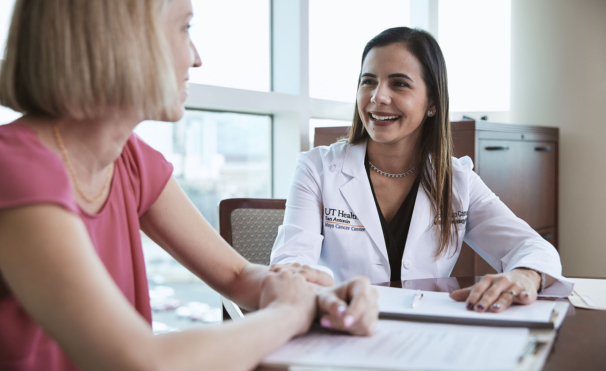 Dr. Mazo talking to a patient