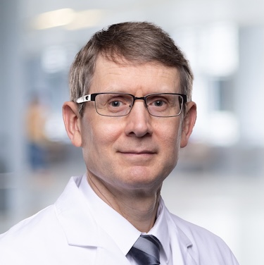 Dr. LeVasseur in his white coat
