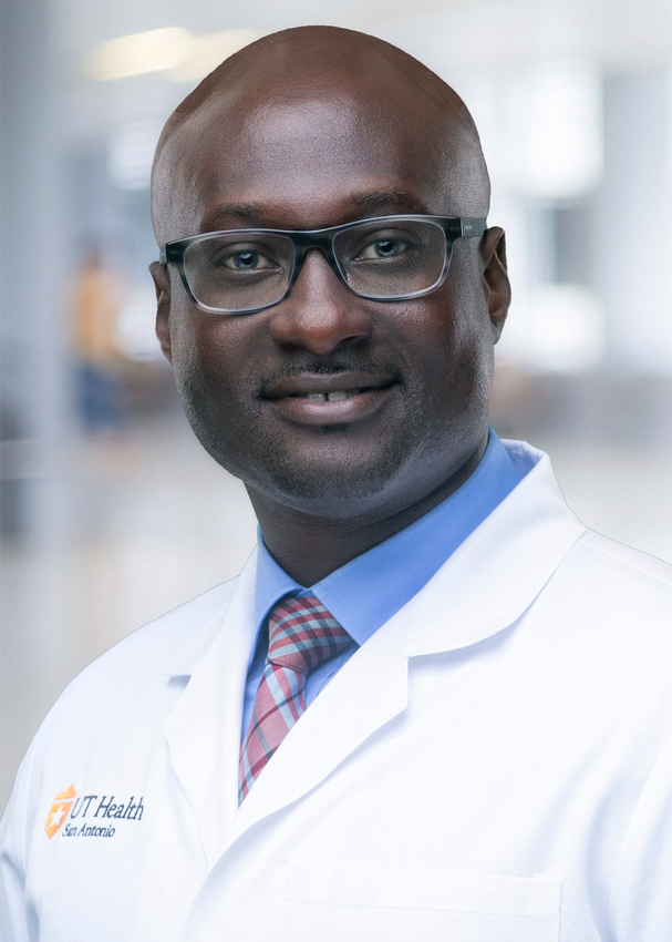 Prince Otchere, MD, MPH headshot in white coat